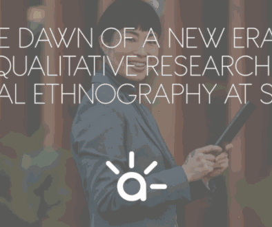 Person using a tablet in an urban setting, representing digital ethnography and modern qualitative research